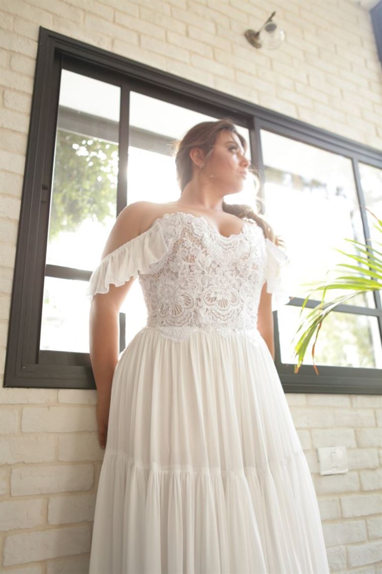 אופנה אמיתית: שיר גינדי מרחיבה את הז'אנר הלבן 10