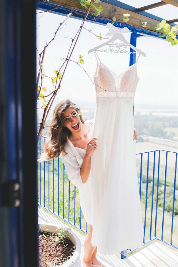 תכף עולה על שמלת כלה, החתונה של אופיר חדור ויניב וילדר (צילום: דינמיקה סטודיו)