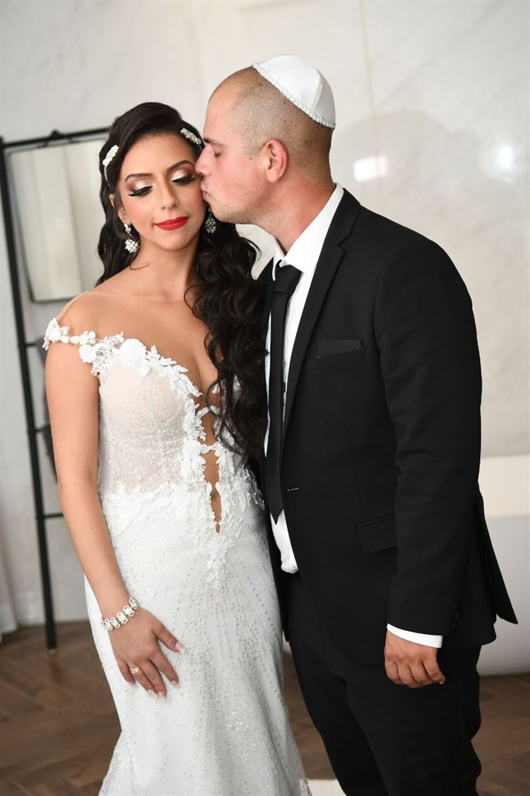 מה הדבר המרגש שעשתה הכלה הבאה בחתונתה? 12