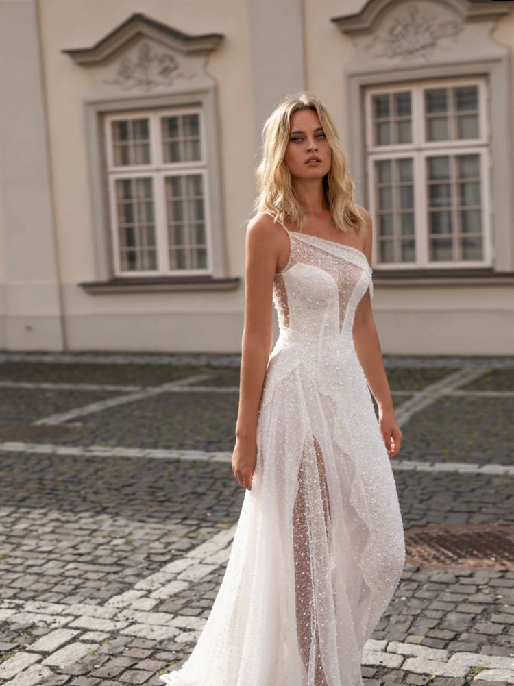 למה הכלות הבריטיות מתאהבות באופנת הכלות הישראלית? 9