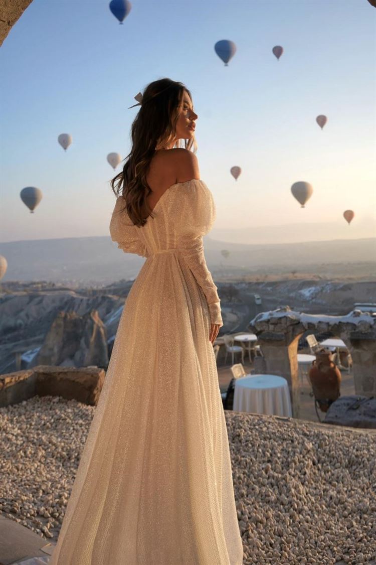 בזמן שנרטבתם: רוסלנה רודינה עולה על שמלת כלה 5